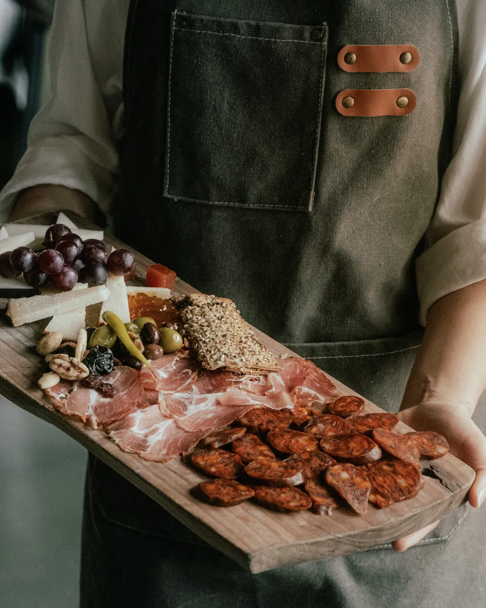 A board of Spanish cured meats and cheeses