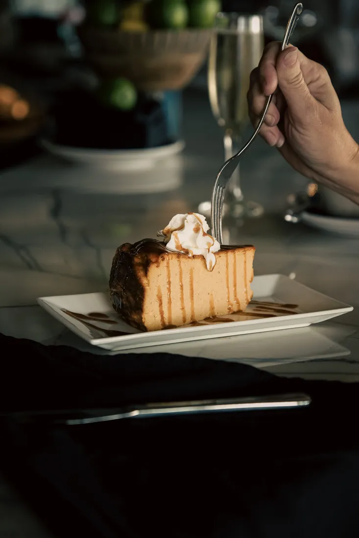 A slice of burnt Basque cheesecake
