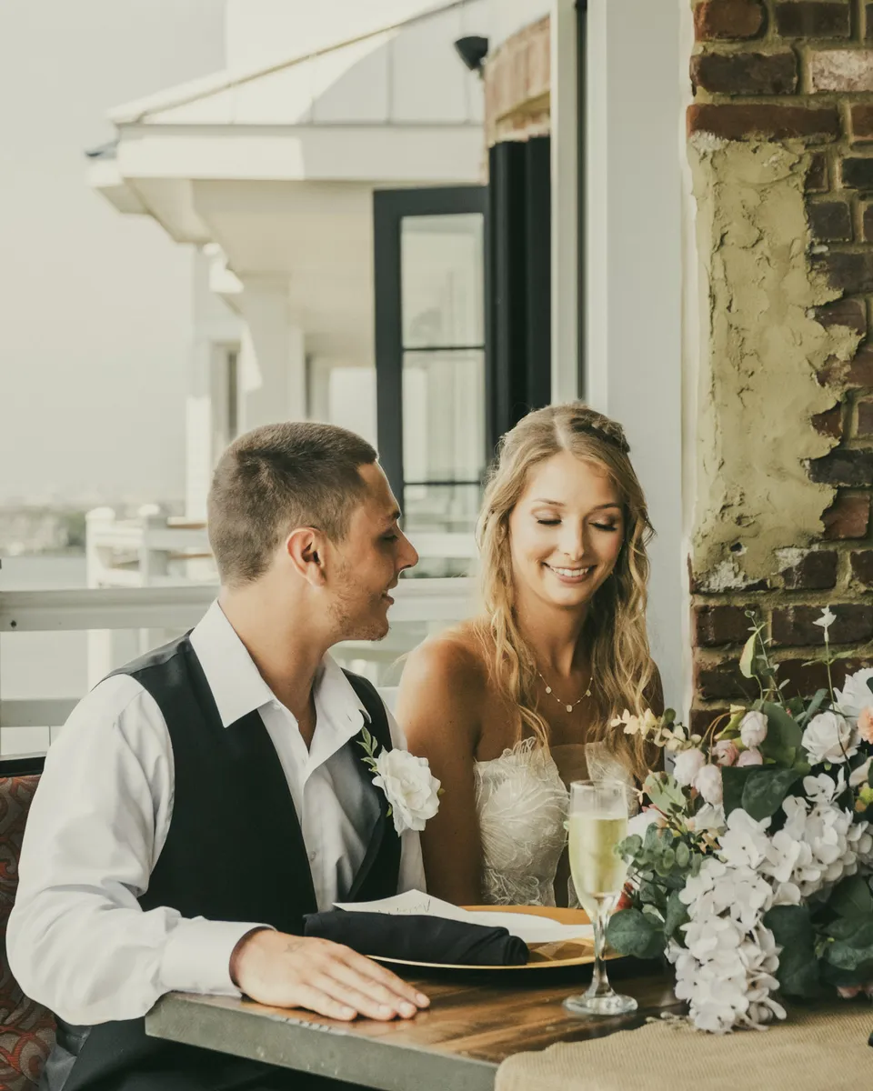 A couple sharing a moment at their wedding reception